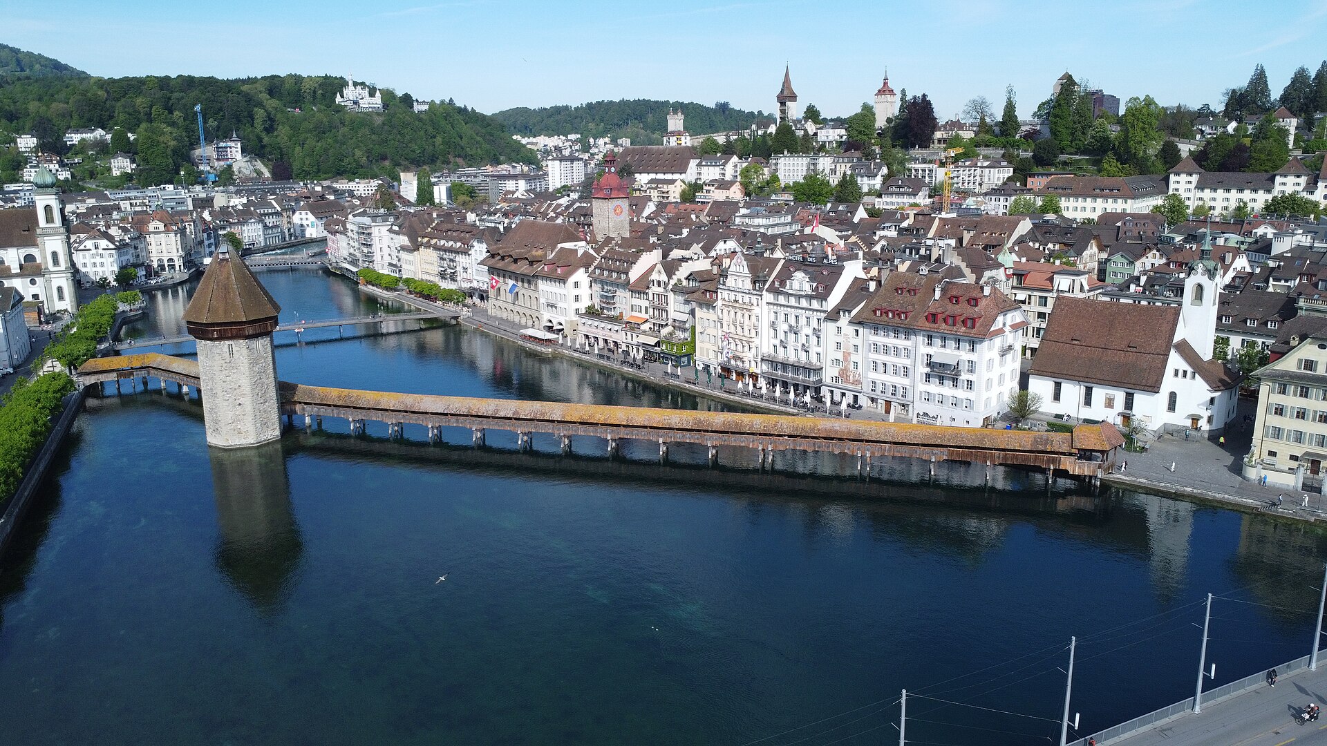 The old town of Lucerne with the Chapel Bridge crossing the river Reuss